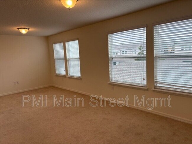 Building Photo - 8130 Red Stopper Ln