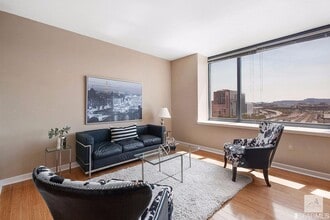 Building Photo - Spacious One-Bedroom Elegance in a Luxury Doorman Building with EV Parking