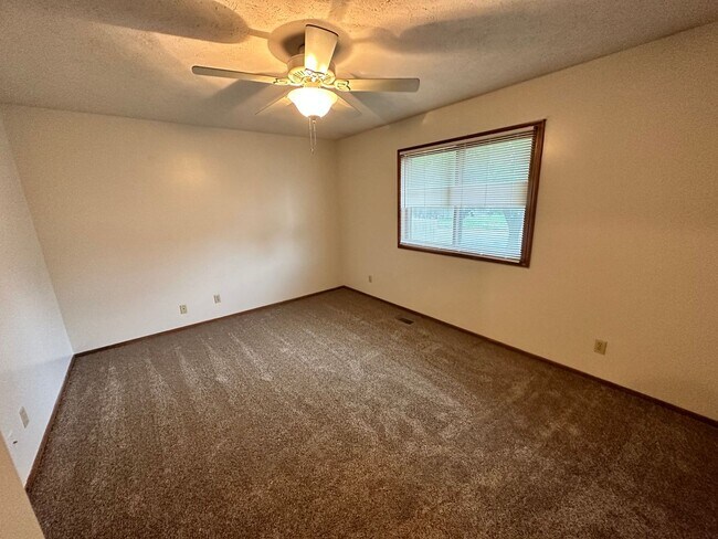 Building Photo - Every Man's Dream... Nice Home with Huge Heated Garage
