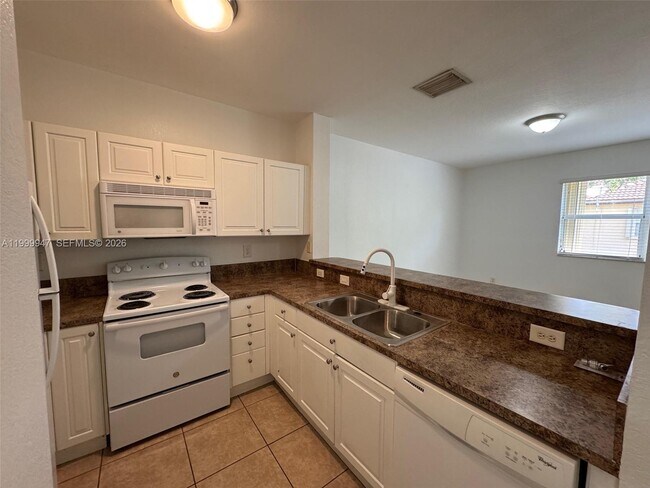 Building Photo - 1690 NE 33rd Ave