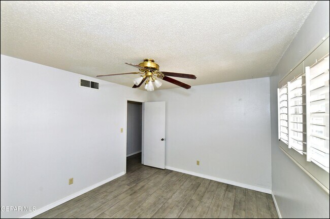 Building Photo - 9125 W H Burges Dr