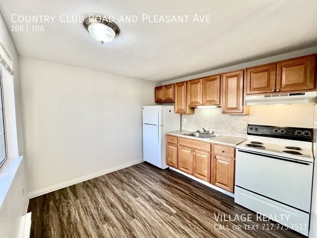 Building Photo - New Cabinets & Flooring! Large 2-bed w/ ea...