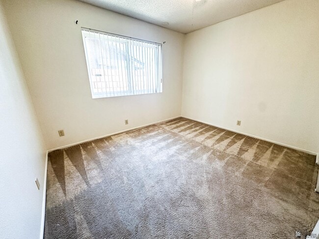 Building Photo - 3555 W 15th Ln