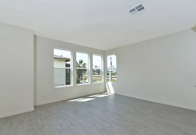 Building Photo - Ultimate Beach House! 3 Bed/3 Bath with Ocean Views from Every Floor, Panoramic Rooftop Deck, Dua...