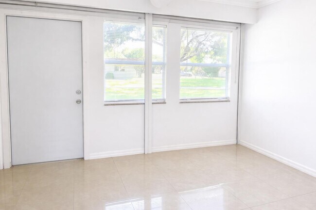 Building Photo - 608 SW Natura Blvd