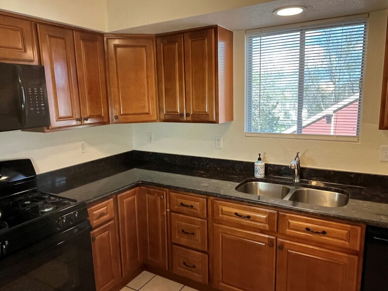 Kitchen with Plenty of Cabinet Space - 10710 Kimball St