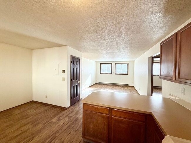 Building Photo - Cozy 2 Bed/1 Bath Apartment in North Loveland. New Wood Floors!