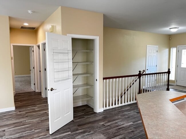 Building Photo - Elegant home in UP with primary bedroom suite on main level