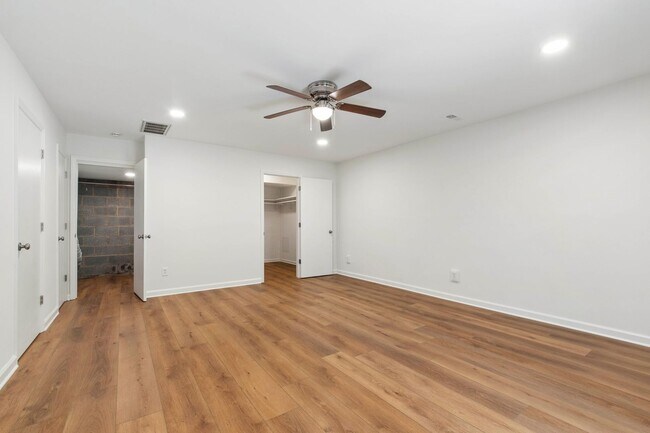 Building Photo - Rare Find: Updated and Modern End-Unit Tow...