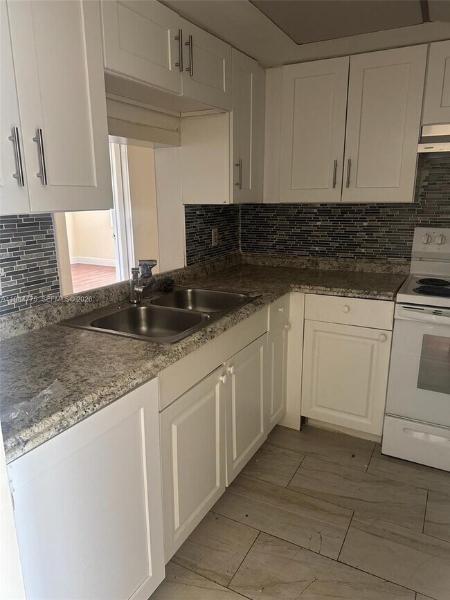 Building Photo - 7779 Tam Oshanter Blvd