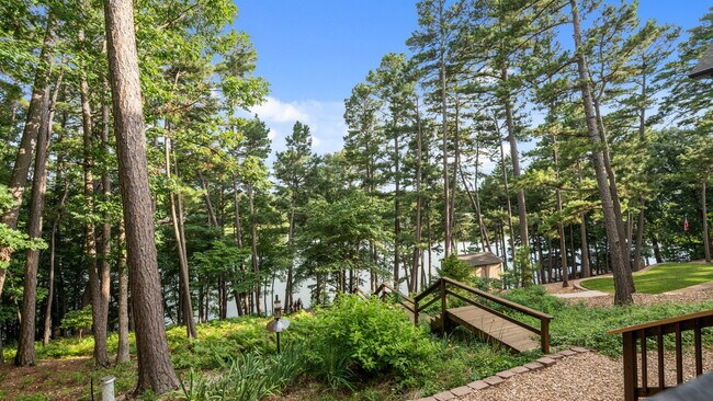 Building Photo - Serene Bella Vista Lakeside 4 bedroom