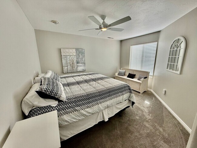 Building Photo - Furnished and Utilities Included: Two-Bedroom Basement Apartment with Private Yard