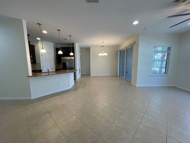 Building Photo - ANNUAL RENTAL - MIRASOL AT COCONUT POINT 3 BED/2 BATH WITH GARAGE