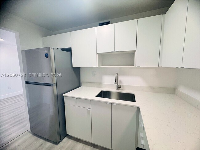 Building Photo - 6095 W 18th Ave