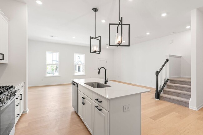 Building Photo - Welcome home to this stunning brand-new townhome in one of Indian Trail's newest and most desirab...