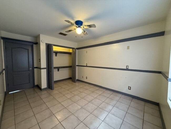 Building Photo - Downstairs -Three-bedroom Condo