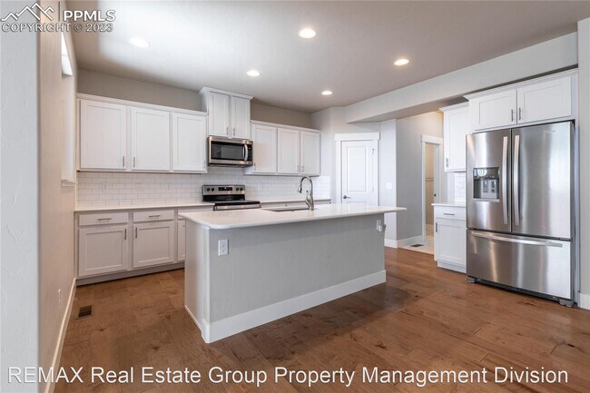 Building Photo - 3 br, 3.5 bath House - 7674 Almond Wood Lp