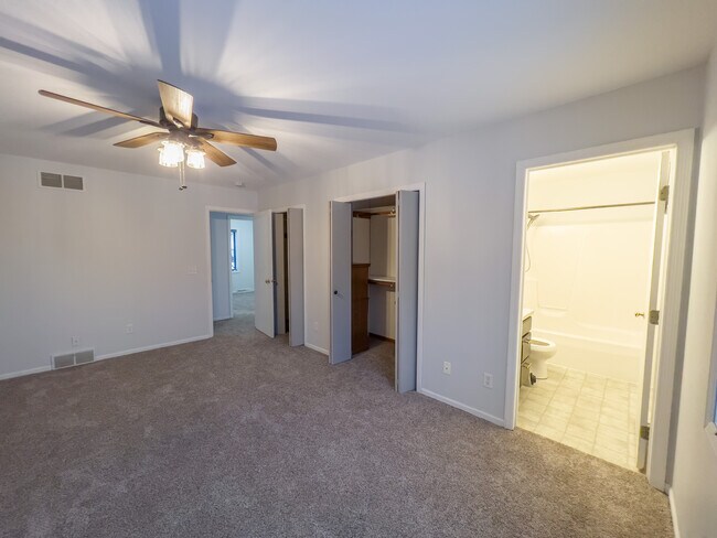 Master bedroom into master bathroom - 605 Ruxton Ridge Dr