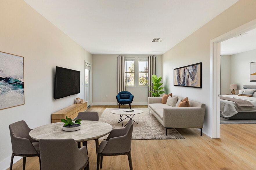 Renovated Package III dining and living room with hard surface flooring - Avalon Encino