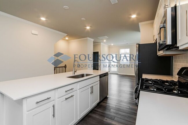 Building Photo - End Unit Town Home | 2nd Floor Back Deck |...