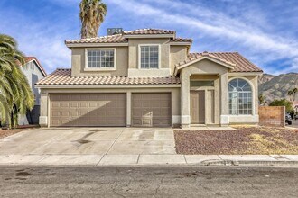 Building Photo - Fully remodeled!  Cozy 4 bedroom with 3 car garage !