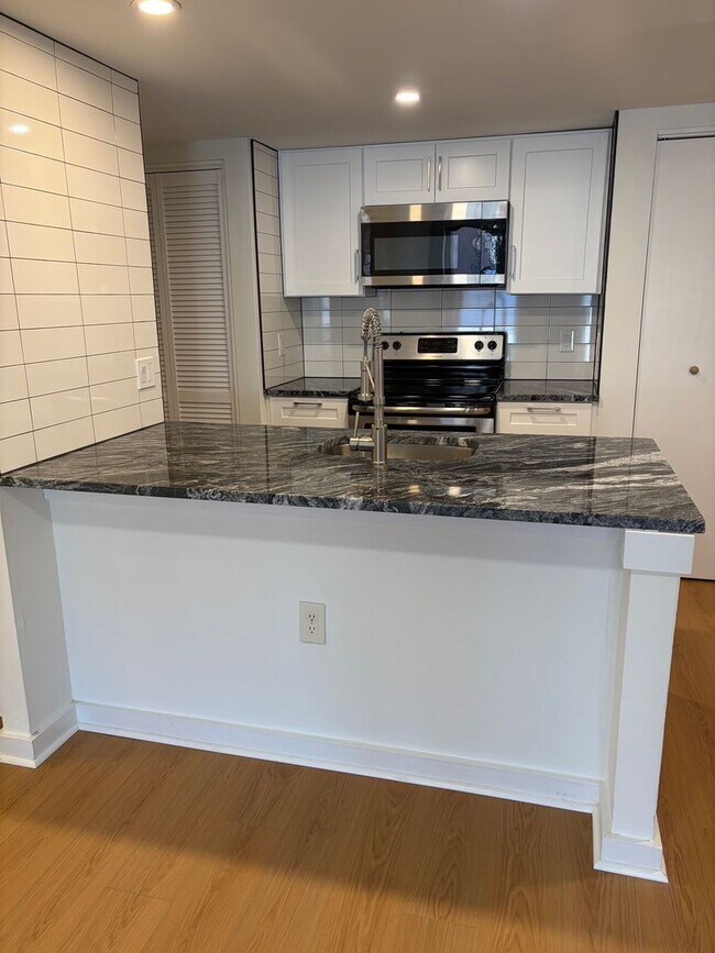 Primary Photo - Welcome to Urban Elegance in the Heart of ...