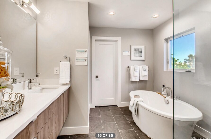 Primary suite with soaking tub, shower, dual vanities and large, walk-in closet - 2765 S Sherman St