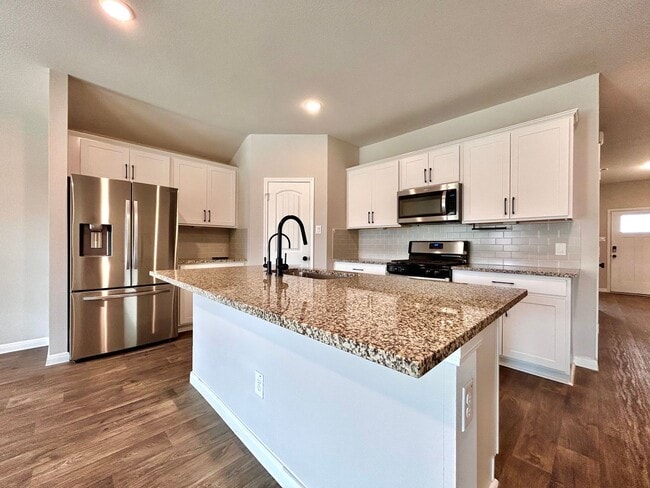 Building Photo - Beautiful 4/BR 2/BA Contemporary Home with Patio, Garage & Laundry Room