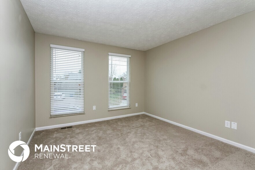 Building Photo - 5678 Colonist Cir