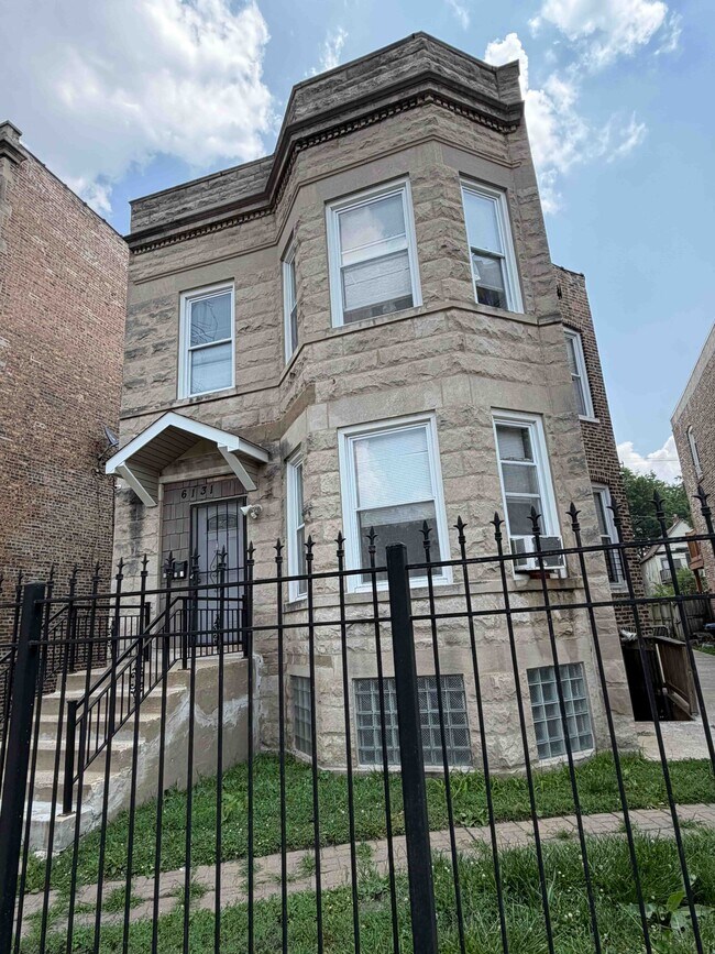 Building Photo - 6131 S Racine Ave