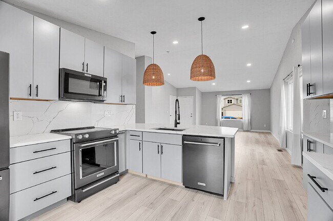 Building Photo - $3,295.95 - 3 bed, 2 bath updated Home in Littleton with Two Full Kitchens and Impressive Yard!