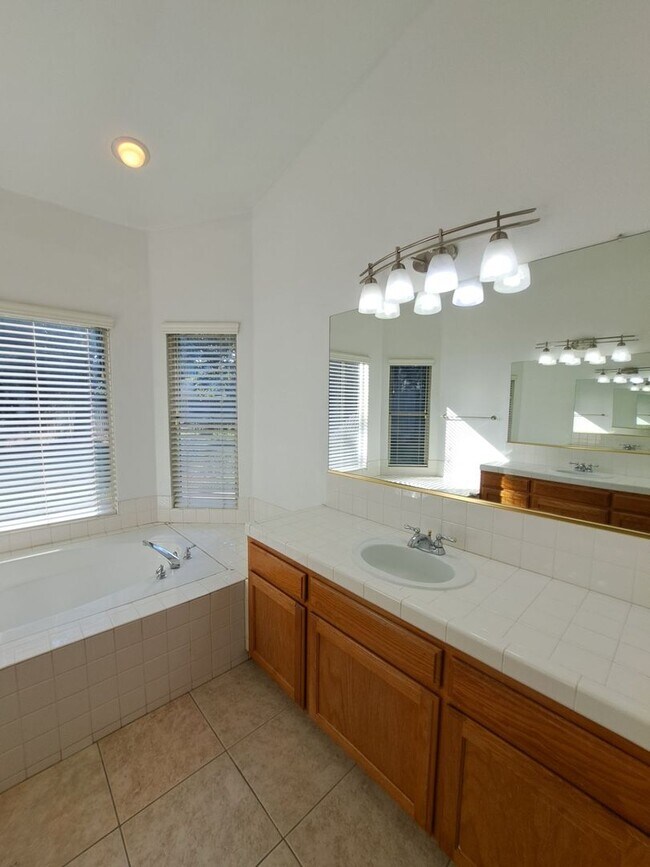 Building Photo - Move in Special: Half OFF your 1st Month's Rent! Elegant 4 Bedroom Home w/ Upstairs Loft Move in ...