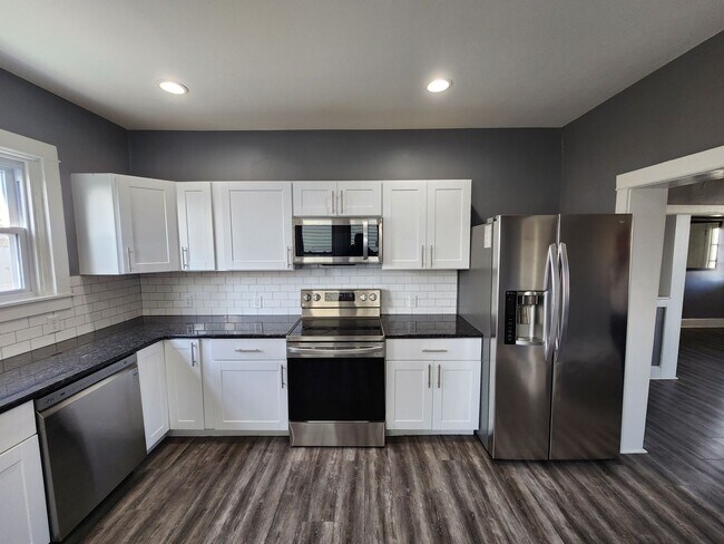 Building Photo - Twin home with stainless appliances, centr...