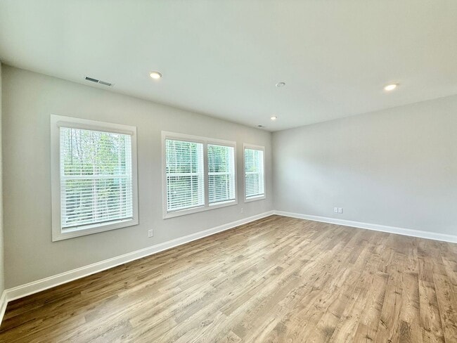 Building Photo - Stunning End Unit New Construction 3BD, 3....