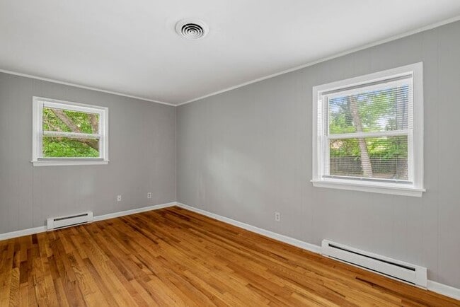 Building Photo - Large Home in Four Seasons Area, Hardwoods, Dining Room, Screed Porch, Fenced!
