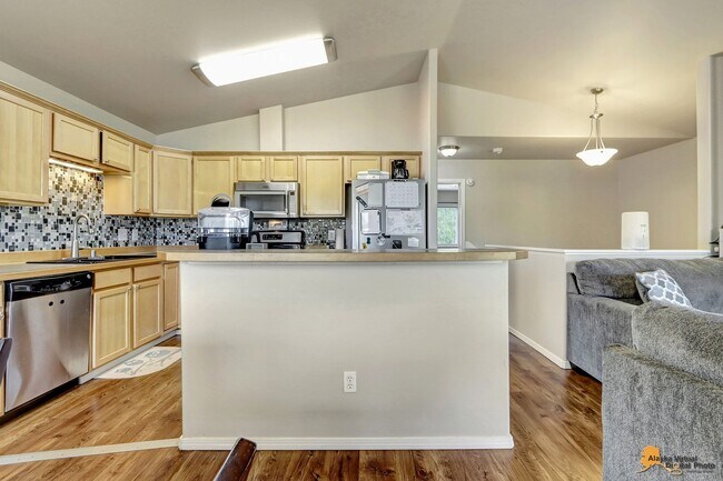 Building Photo - East Anchorage Home with Utilities Included!! Close to JBER! Attached Two Car Garage + Fenced in ...