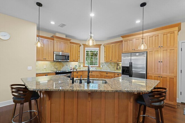 Building Photo - A Sunlit Custom Yellow Cottage in Greystone - Where Comfort Lives!