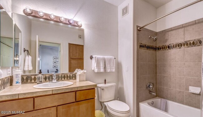 Building Photo - 7050 E Sunrise Dr