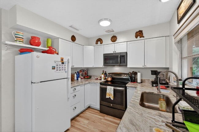 Building Photo - Island Living Made Easy — Remodeled 2BR Home, Fully Fenced Yard Near Downtown St. Pete