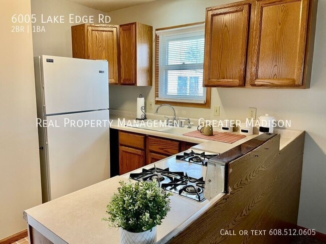 Building Photo - Cozy 2 Bed Home with Lake Waubesa Access!