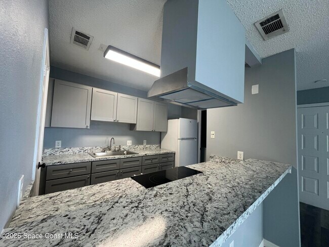 Building Photo - 225 S Tropical Trail