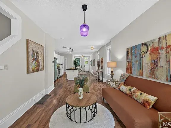 Living room, kitchen, dining room on first floor. - 1731 Nicholson Pl