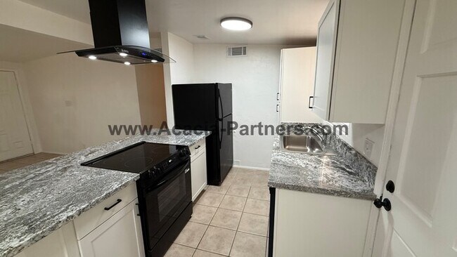 Building Photo - Three Bedroom/Two Bath Home