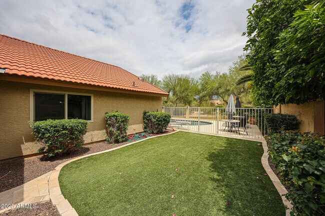 Building Photo - 9085 E Windrose Dr