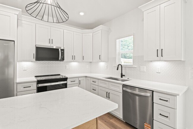 Building Photo - New Construction 3 Bedroom Townhome