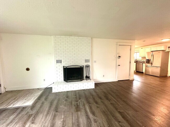 Building Photo - Three bedroom home with large fenced yard