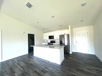 Building Photo - Available Now!! NW CAPE CORAL - 4 Bedrooms - 3 Bathrooms - 2 Car Garage