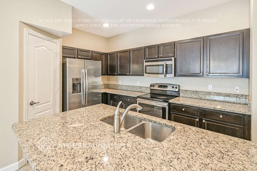 Building Photo - 9495 SW Merlin Ct