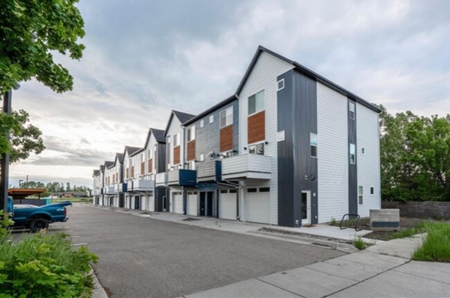 Primary Photo - 3-Story Urban Walk Up at a modern communit...