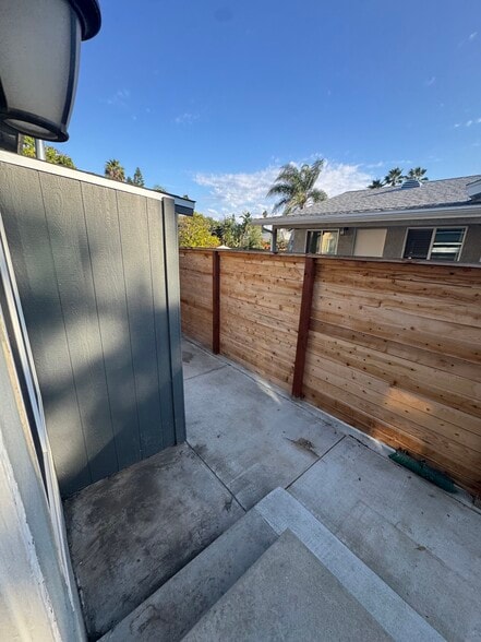 Laundry space / backyard from doorway - 8043 Roy St